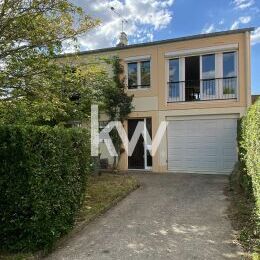 Maison  F7 avec double Garage et jardin clos au calme